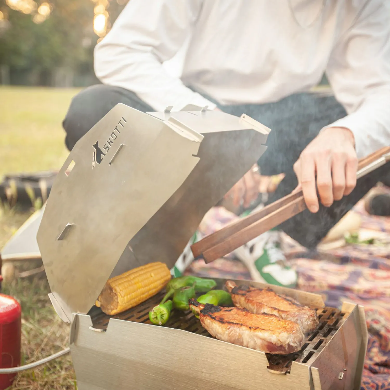 Skotti Cap< Grillzubehör